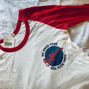 Baseball-style long sleeve crop tee. Brand new, never worn.